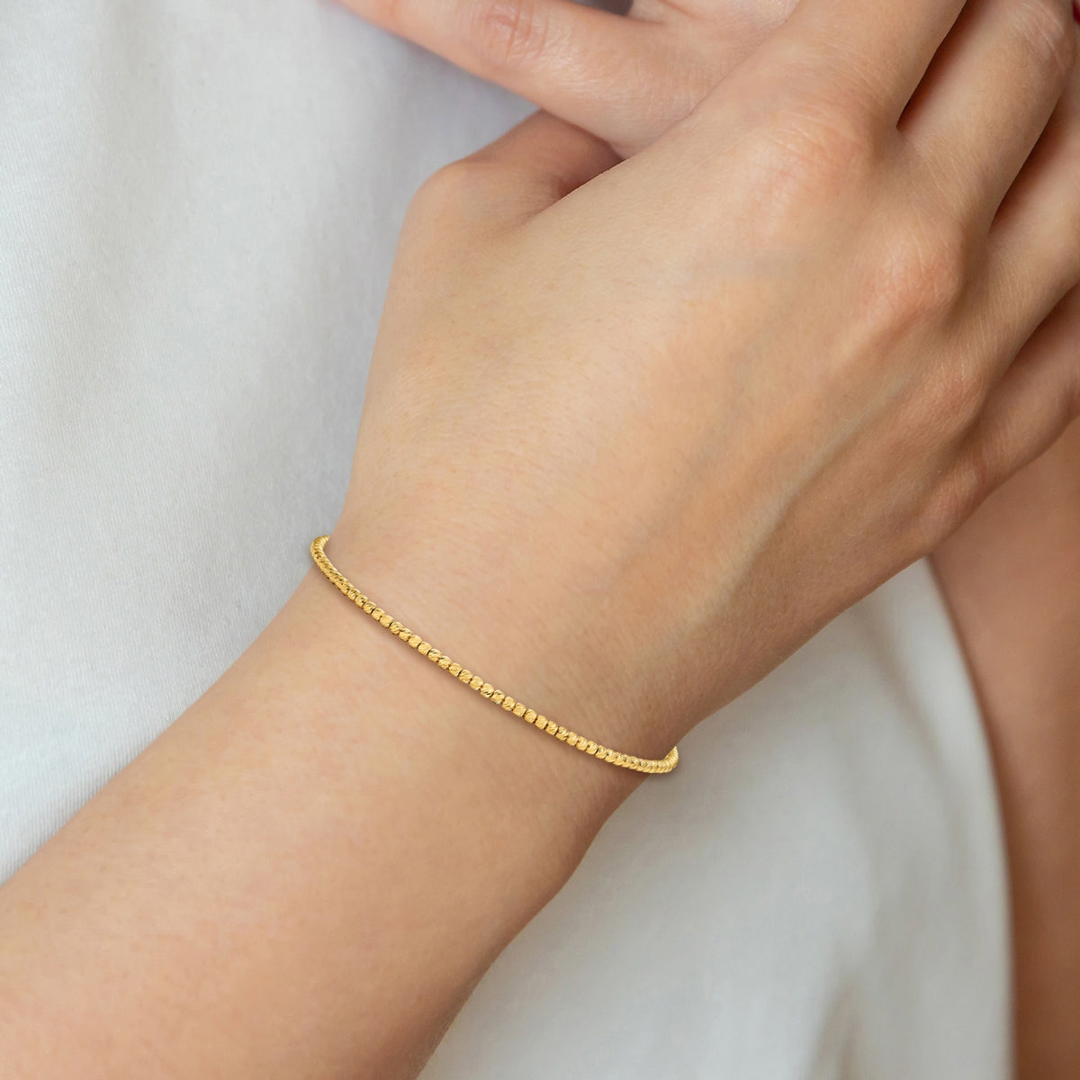 Textured Bead Flexible Bangle Bracelet in 14K Yellow Gold front view