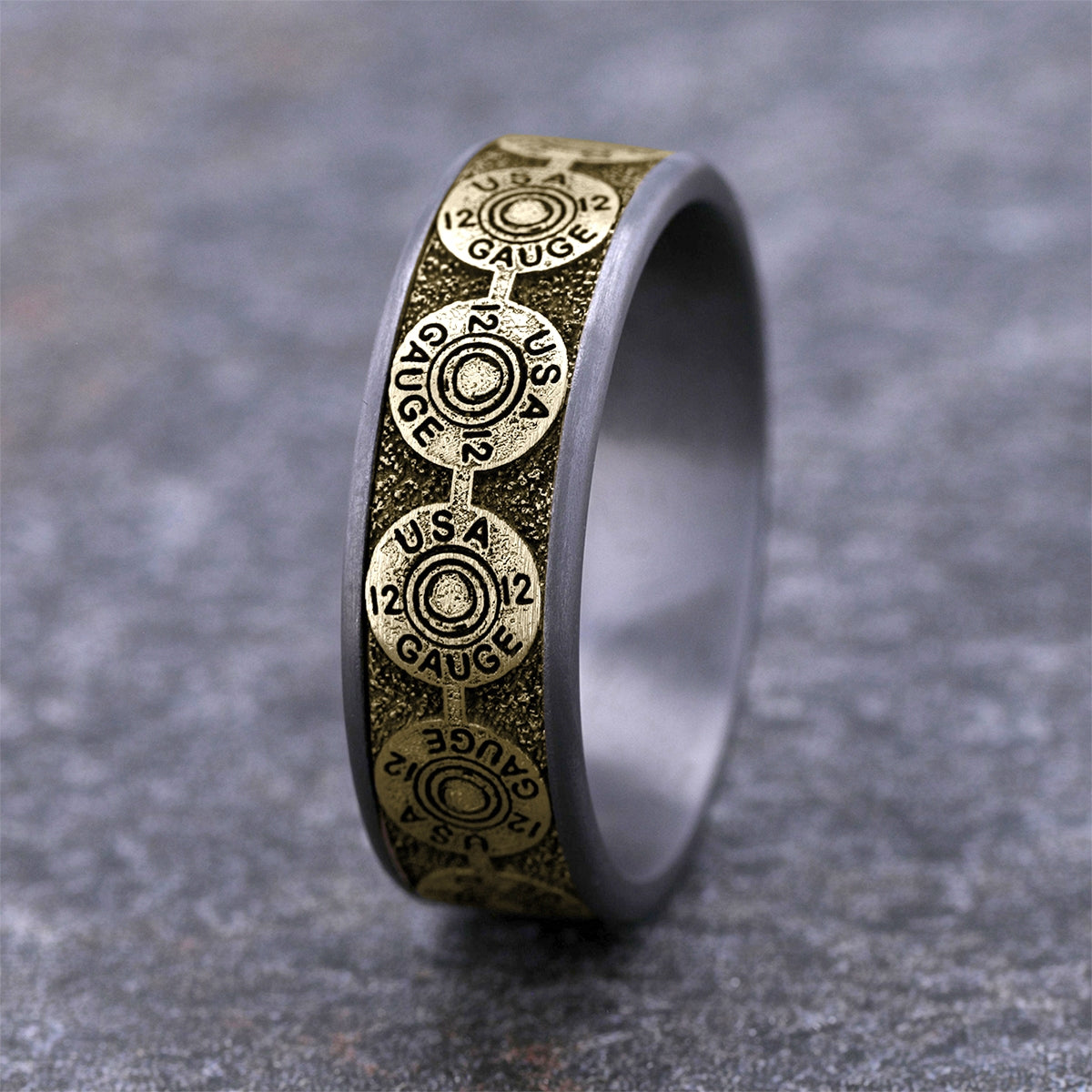 Men's 7.5mm 12 Gauge Wedding Ring in Gray Tantalum & 14K Yellow Gold close-up detail