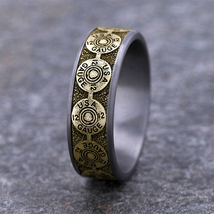 Men's 7.5mm 12 Gauge Wedding Ring in Gray Tantalum & 14K Yellow Gold close-up detail