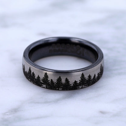 Men's 6.5mm Tree Line Wedding Ring in Black Titanium close-up detail