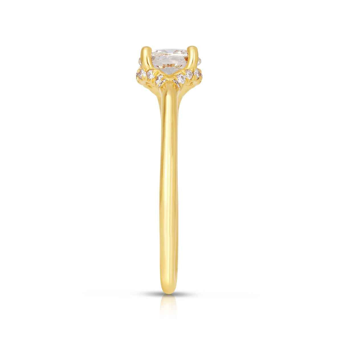 Natural 5/8 ct. tw. Oval Diamond Hidden Halo Engagement Ring in 14K Yellow Gold close-up detail