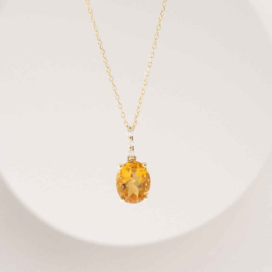 Oval Citrine & Diamond Accent Drop Pendant in 10K Yellow Gold front view