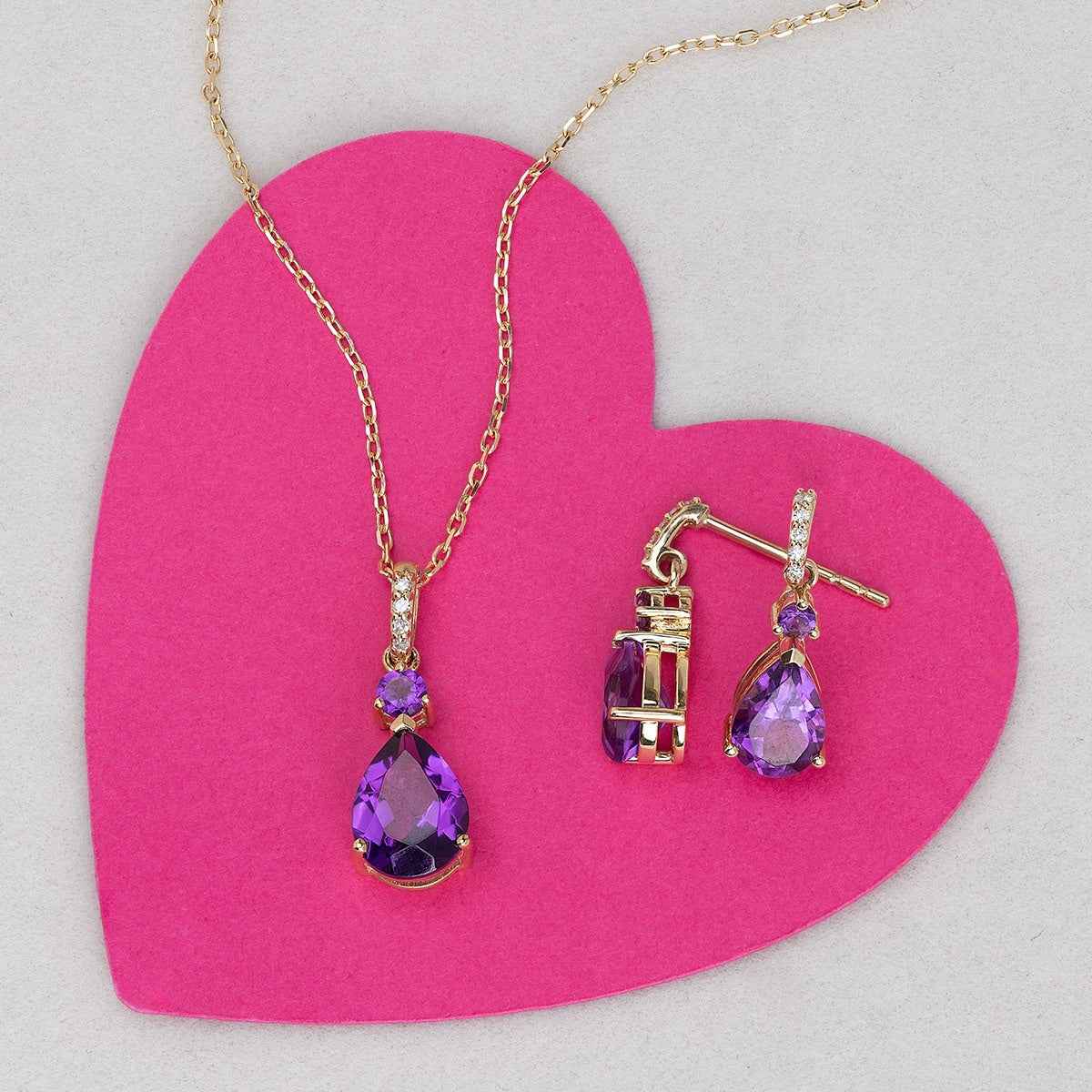 Pear & Round Amethyst & Diamond Accent Pendant in 10K Yellow Gold close-up detail
