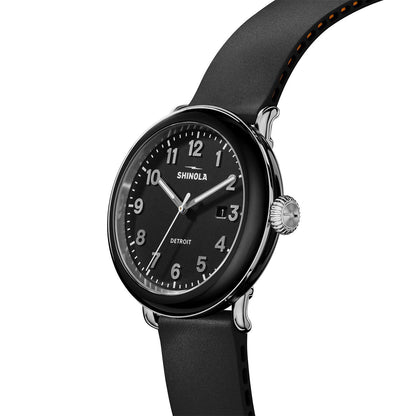 black stainless steel Shinola Detrola quartz watch with black dial and rubber strap