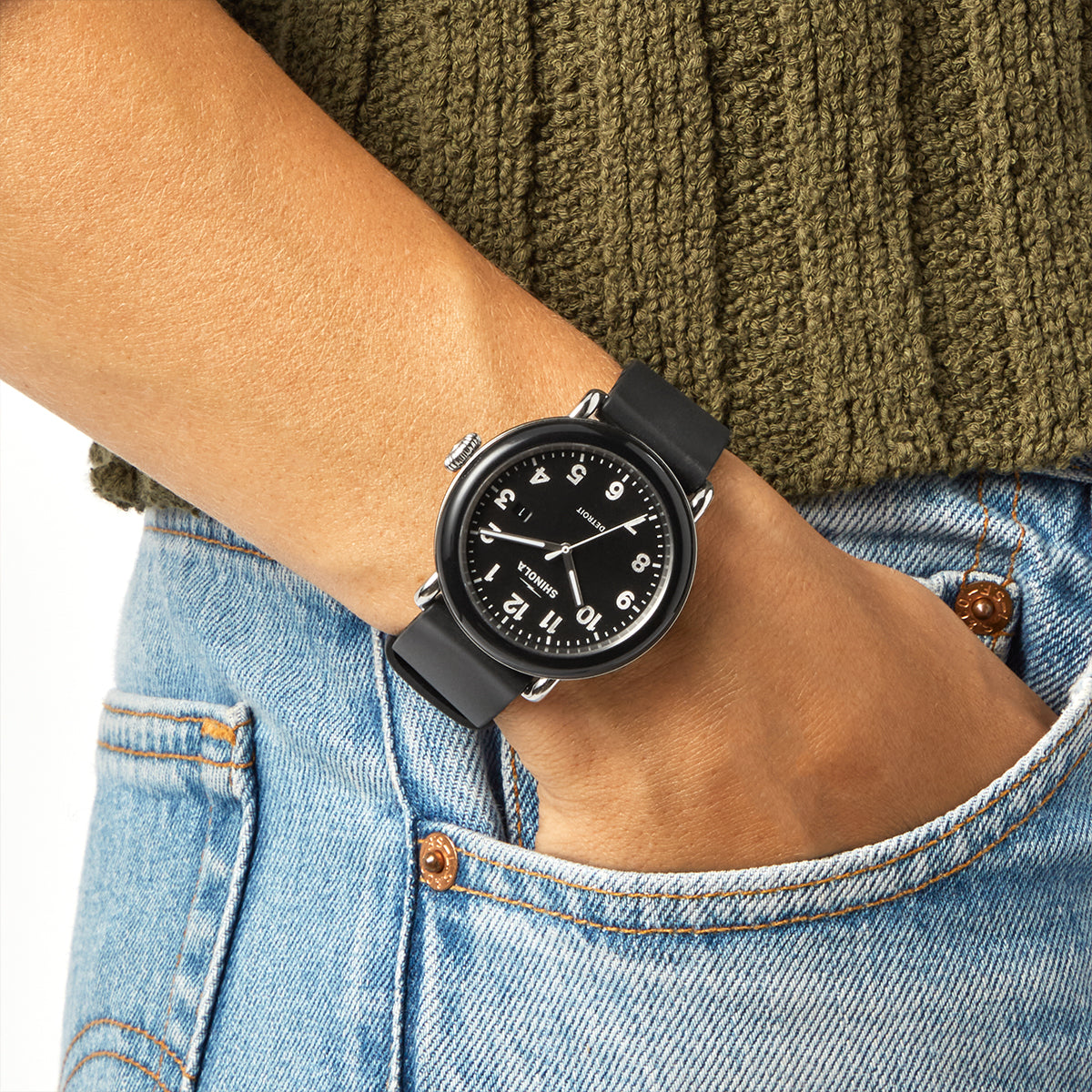 black stainless steel Shinola Detrola quartz watch with black dial and rubber strap