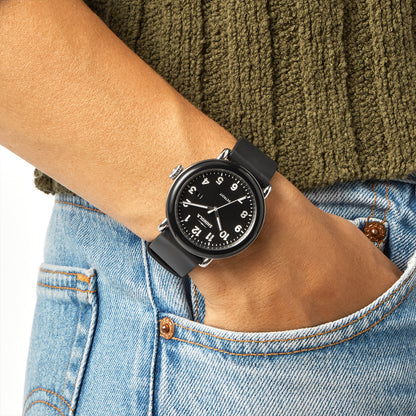 black stainless steel Shinola Detrola quartz watch with black dial and rubber strap