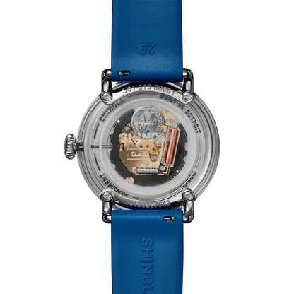 stainless steel Shinola Detrola quartz watch with blue dial and rubber strap