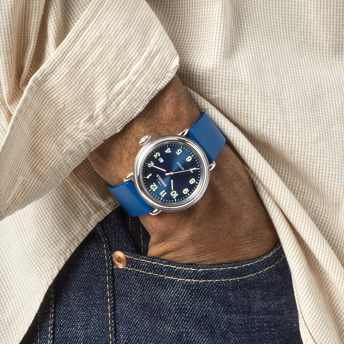 stainless steel Shinola Detrola quartz watch with blue dial and rubber strap