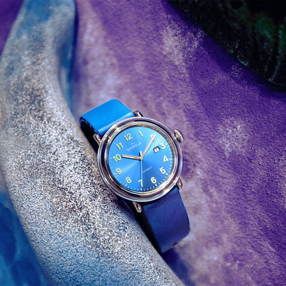 stainless steel Shinola Detrola quartz watch with blue dial and rubber strap