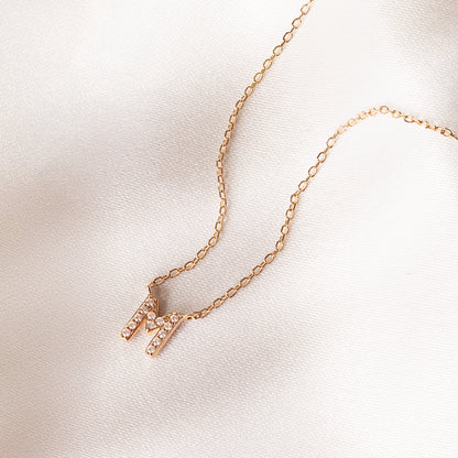 10k yellow gold initial m necklace with 1/20 ct. tw. diamond accents