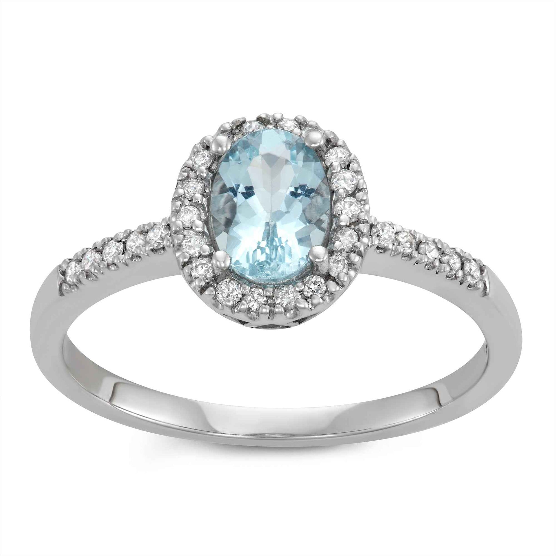 Genuine Oval Aquamarine Fashion Ring with 1/8 ct. tw. Diamond Halo & Band in 10K White Gold