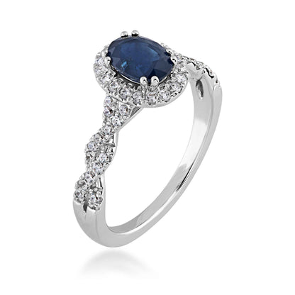 Genuine Oval Blue Sapphire Fashion Ring with 1/3 ct. tw. Diamond Halo & Twist Band in 10K White Gold front view