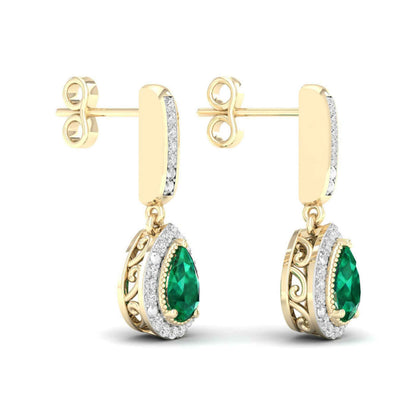 Pear Emerald and 1/10 ct. tw. Diamond Halo Filigree Earrings with Milgrain Detailing in 10K Yellow Gold front view