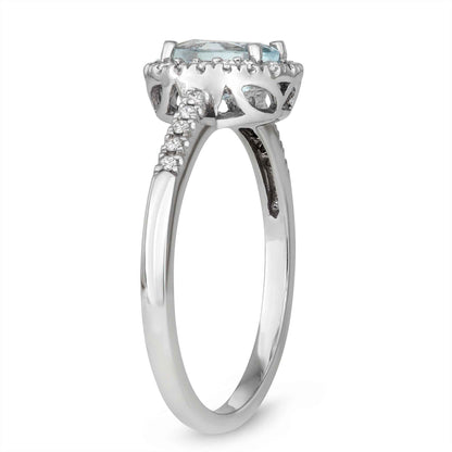 Genuine Oval Aquamarine Fashion Ring with 1/8 ct. tw. Diamond Halo & Band in 10K White Gold front view