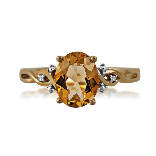 Oval Citrine & Diamond Accent Twist Shank Ring in 10K Yellow Gold close-up detail