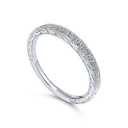 Gabriel & Co. .10 ct. tw. Vintage Style Wedding Band with Side Carving and Milgrain Detailing in 14K White close-up detail