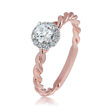 Natural 3/8 ct. tw. Round Diamond Halo Twist Engagement Ring in 10K Pink Gold front view