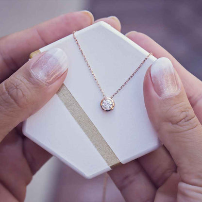 1/2 ct. tw. Round Sliding Bezel Set Diamond Pendant in 14K Pink Gold front view