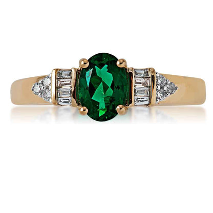 Created Oval Emerald Ring with 1/8 ct. tw. Round & Baguette Diamonds in 10K Yellow Gold front view