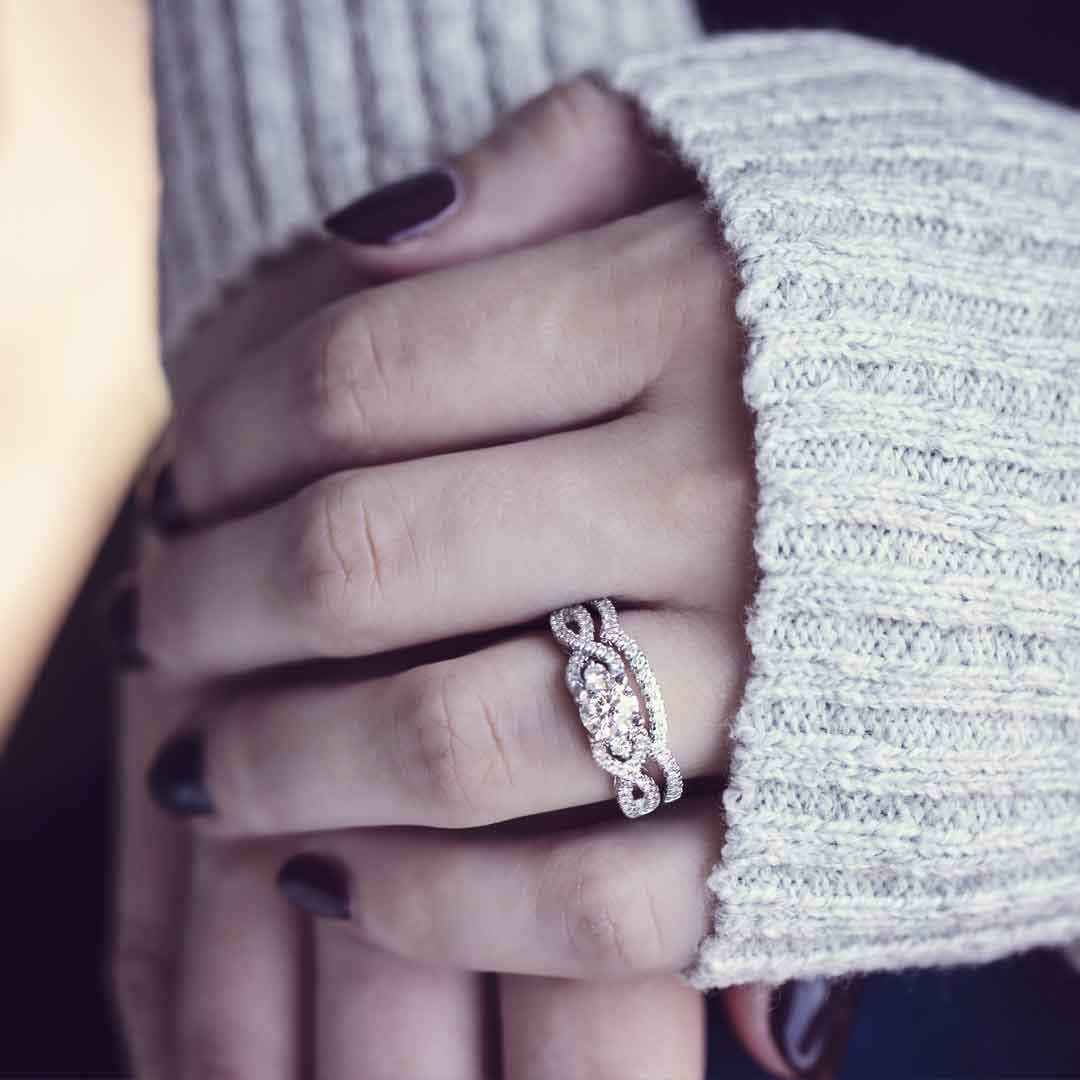 Noventa 1-1/4 ct. tw Round Diamond Wedding Set with Infinity Inspired Band in 14K White Gold close-up detail
