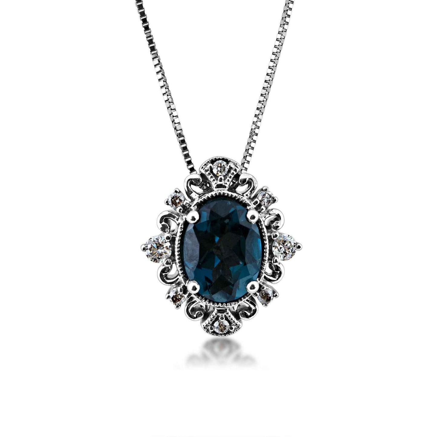 Impulse Collection Genuine Oval London Blue Topaz Fashion Pendant with 1/8 ct. tw. Diamond Filigree & Milgrain Halo in 10K