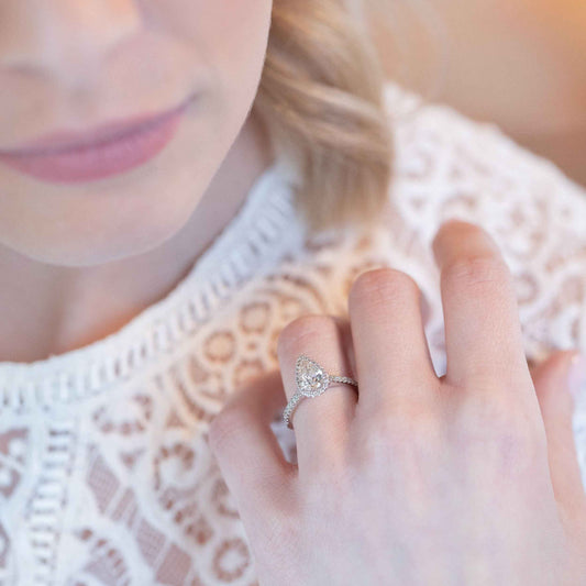 Natural 1-1/4 ct. tw. Pear Diamond Halo Engagement Ring in 14K White Gold side profile