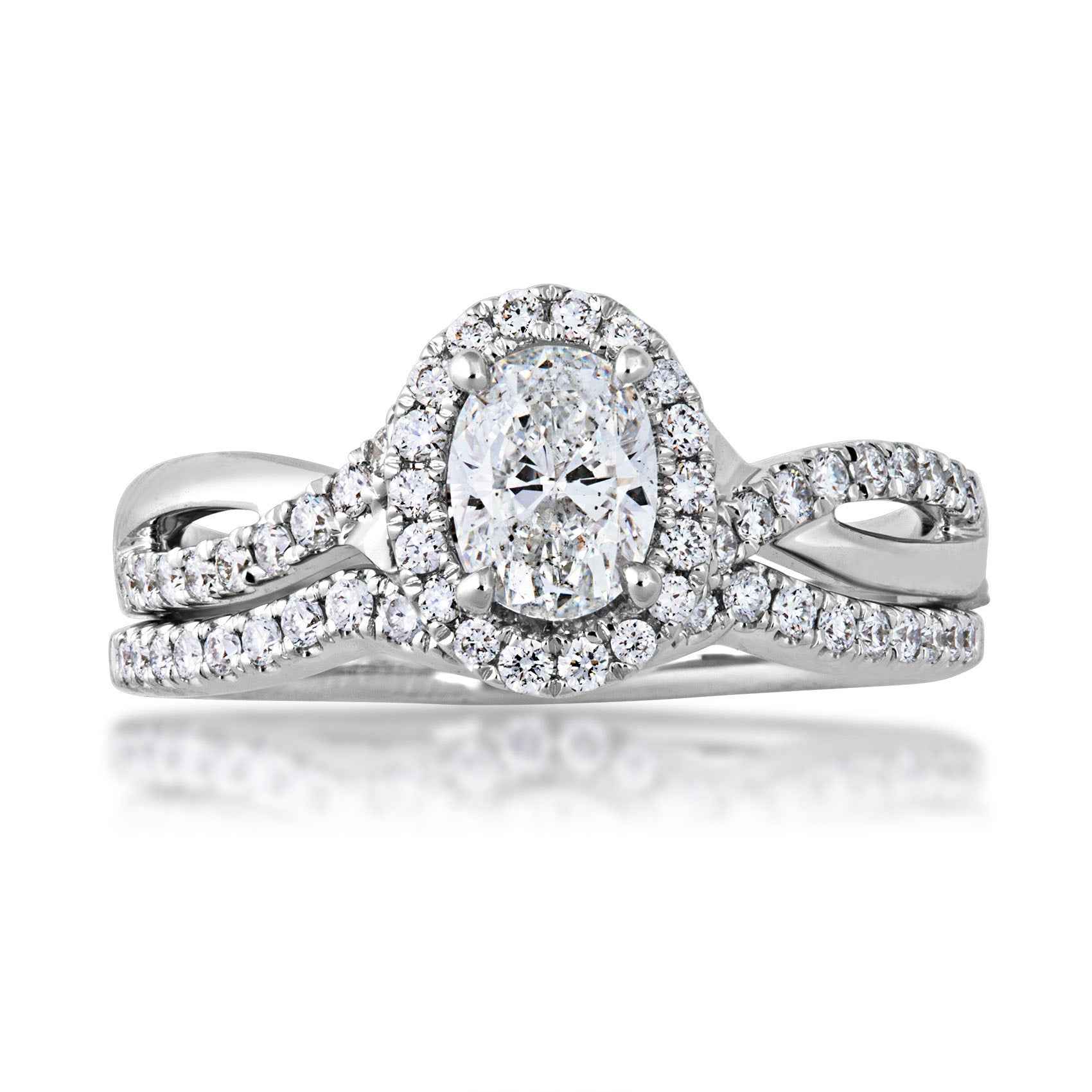 Canadian Rocks 5/6 ct. tw. Oval Diamond Halo Wedding Set with Twisted Designed Band in 14K White Gold close-up detail
