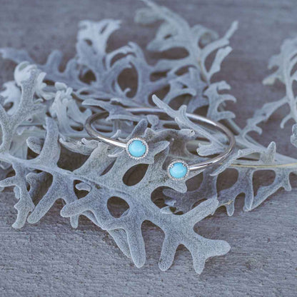 Turquoise and 1/5 ct. tw. Diamond Cuff Bracelet in Sterling Silver front view
