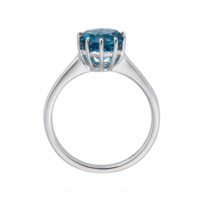 Round London Blue Topaz Solitaire Ring in 10K White Gold front view