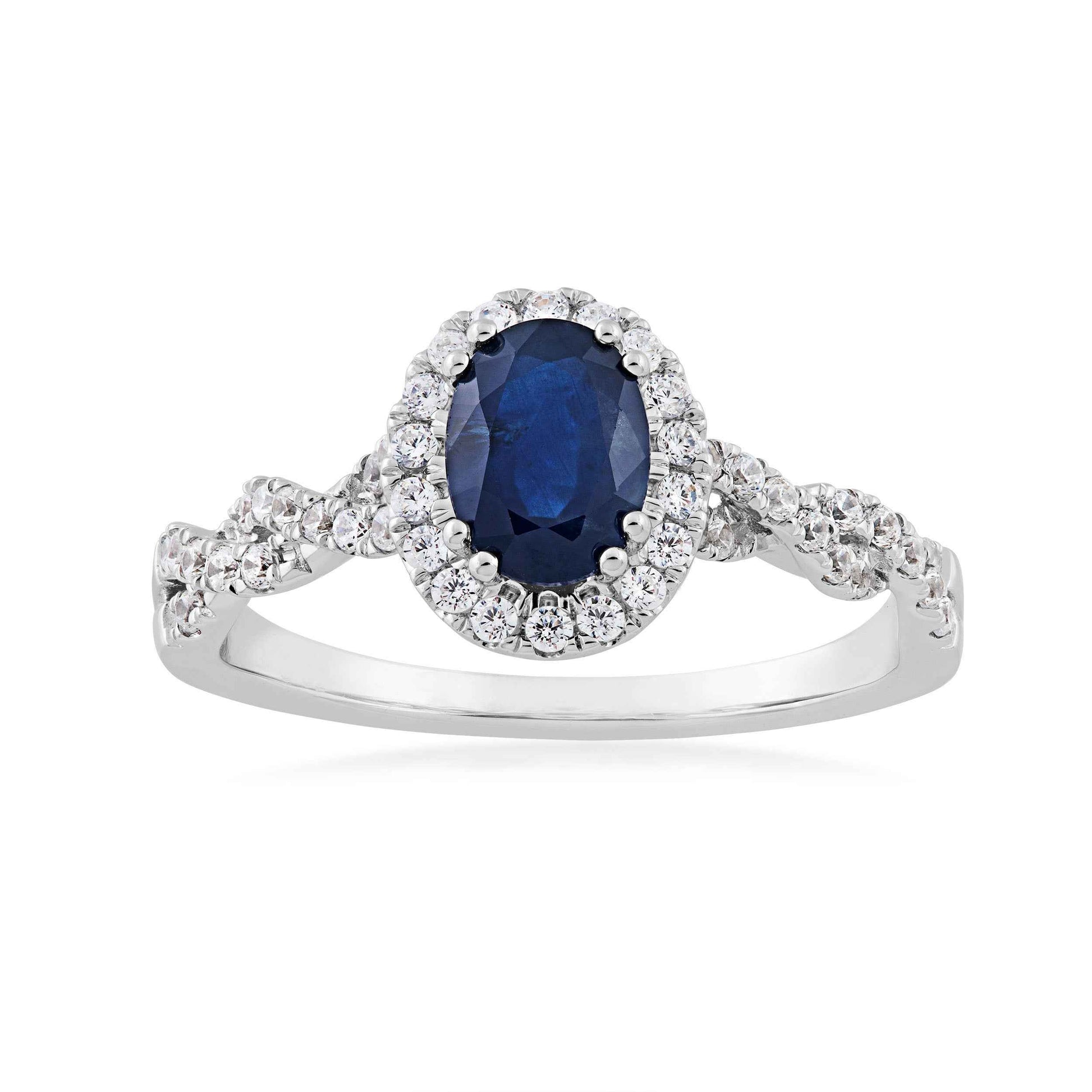 Genuine Oval Blue Sapphire Fashion Ring with 1/3 ct. tw. Diamond Halo & Twist Band in 10K White Gold
