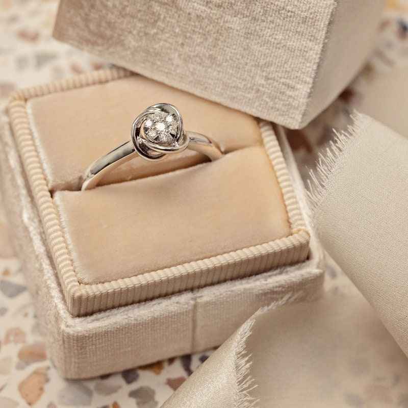 Love Knot 1/10 ct. tw. Diamond Cluster Ring in 10K White Gold front view