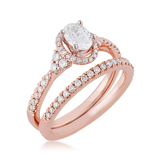 Noventa 1 ct. tw. Oval Diamond Hidden Halo Wedding Set with Cluster Diamond Accented Band in 14K Pink Gold close-up detail