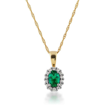 Created Oval Emerald & 1/10 ct. tw. Diamond Halo Pendant in 10K Yellow Gold