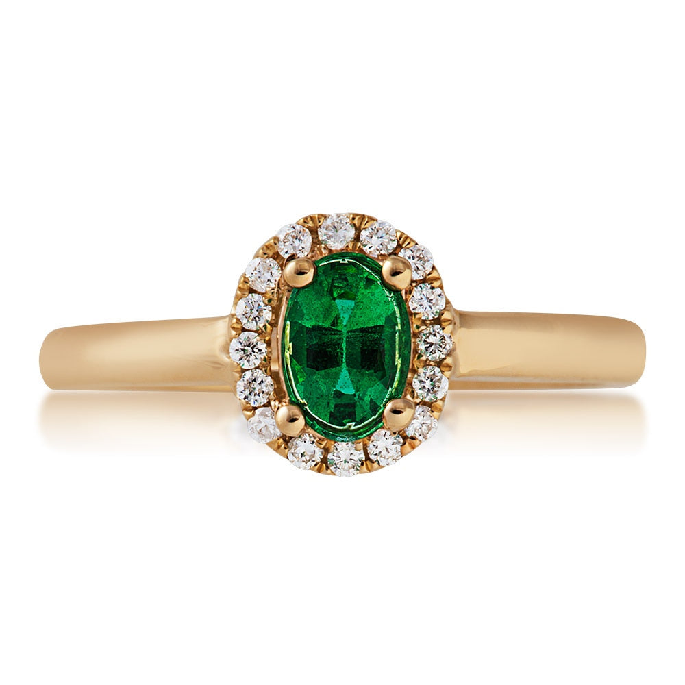 Emerald and 1/10 ct. tw. Round Diamond Halo Fashion Ring in 10K Yellow Gold close-up detail