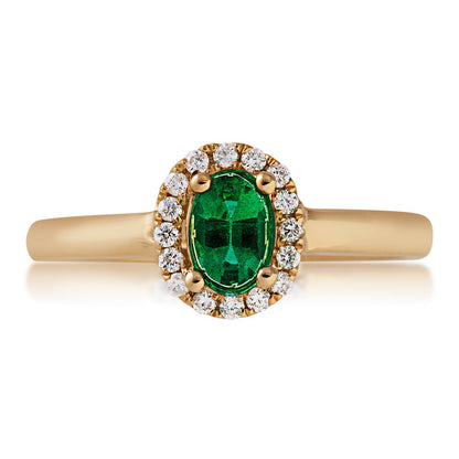 Emerald and 1/10 ct. tw. Round Diamond Halo Fashion Ring in 10K Yellow Gold close-up detail