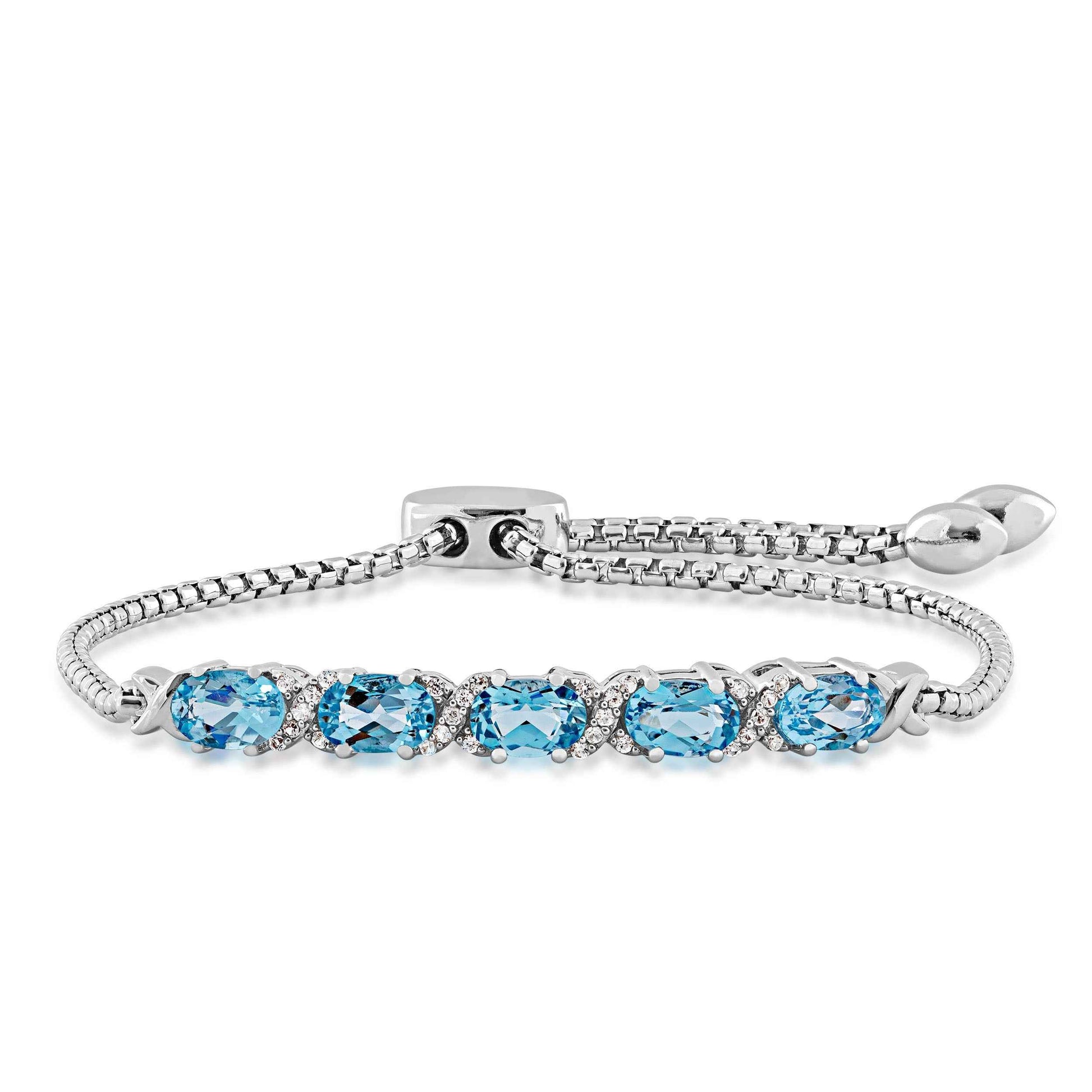 Genuine Oval Blue Topaz & Created White Sapphire Accented Bolo Bracelet in sterling Silver