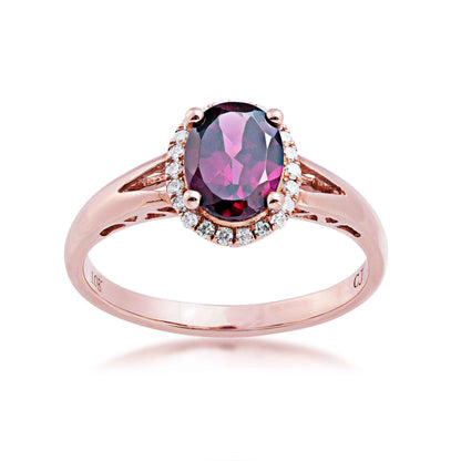 Oval Garnet and 1/8 ct. tw. Diamond Halo Fashion Ring with Split Shank in 10K Pink Gold