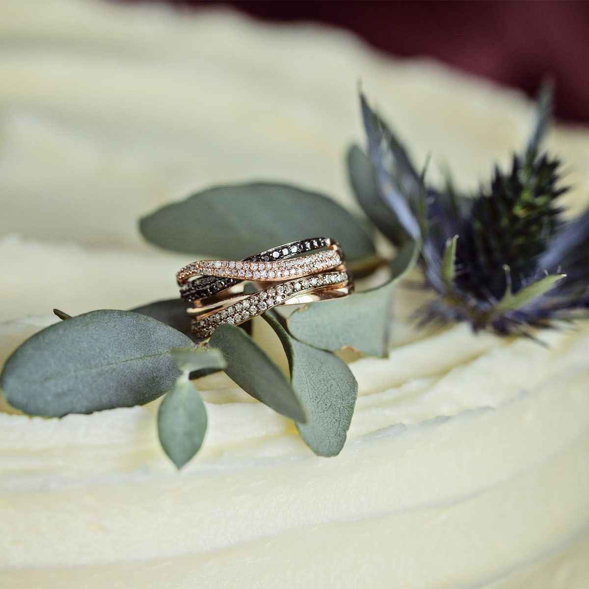 1/3 ct. tw Treated Black White and Mocha Diamond Intertwining Fashion Ring in 10K Pink Gold close-up detail