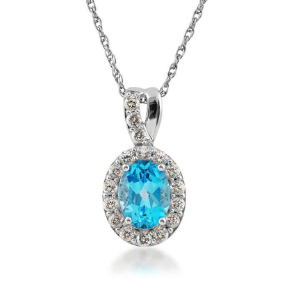 Oval Swiss Blue Topaz and Created White Sapphire Halo Pendant in Sterling Silver