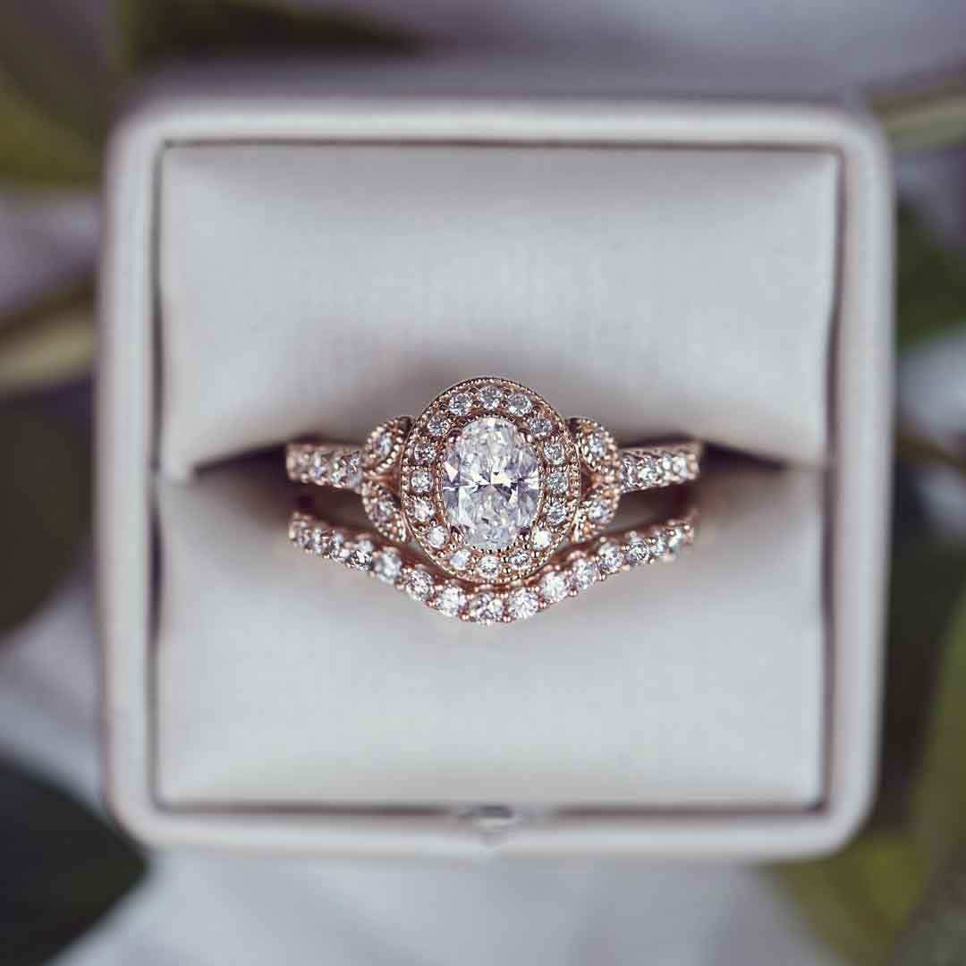 Amaura Collection 1 ct. tw Oval Diamond Halo Wedding Set with Floral Milgrain Inspired Band in 14K Pink Gold side profile