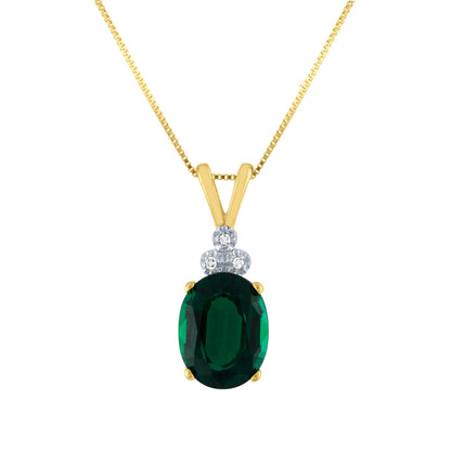Created Oval Emerald and .009 ct. tw. Miracle Plated Diamond Pendant in 10K Yellow Gold