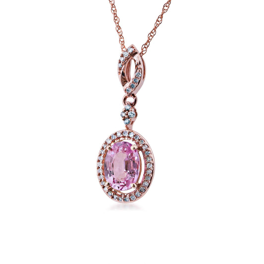 Pink Sapphire and 1/8 ct. tw. Diamond Oval Halo Pendant in 10K Pink Gold