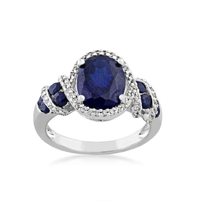 Created Blue Sapphire and Created White Sapphire Oval Fashion Ring with Wraparound Design in Sterling Silver