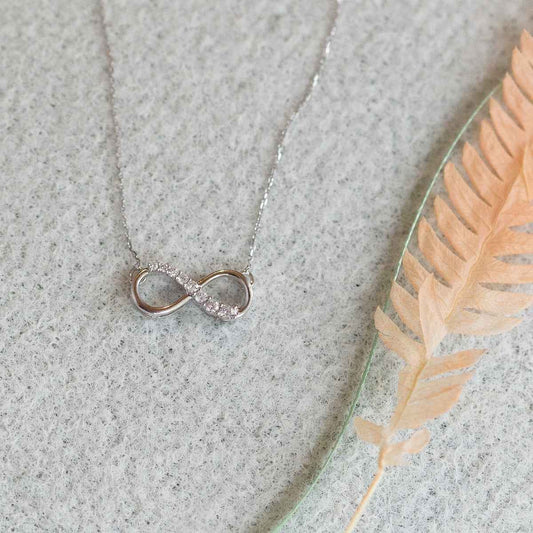 Journey Collection 1/10 ct. tw. Diamond Infinity Pendant in 10K White Gold front view