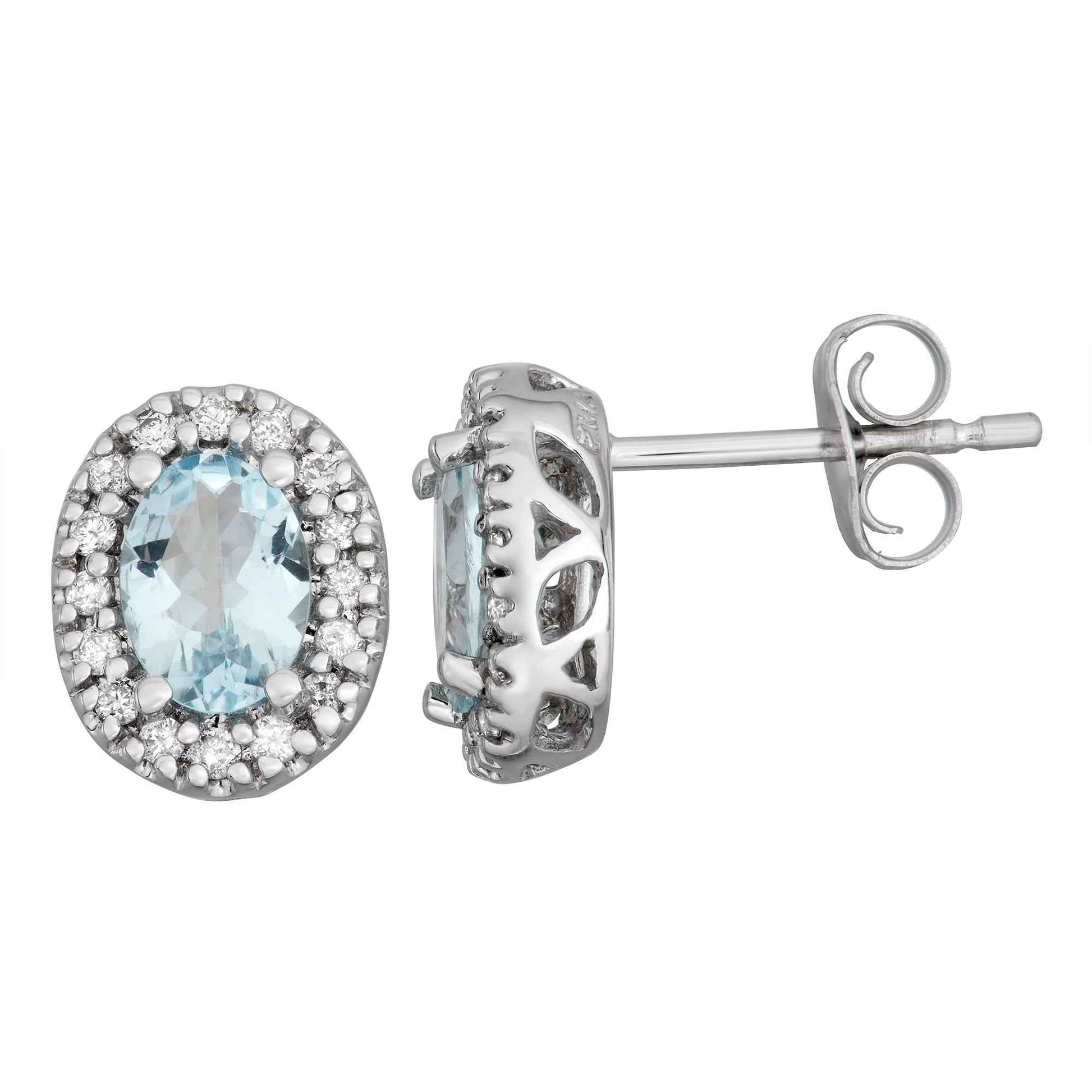 Genuine Oval Aquamarine Fashion Earrings with 1/6 ct. tw. Diamond Halos in 10K White Gold