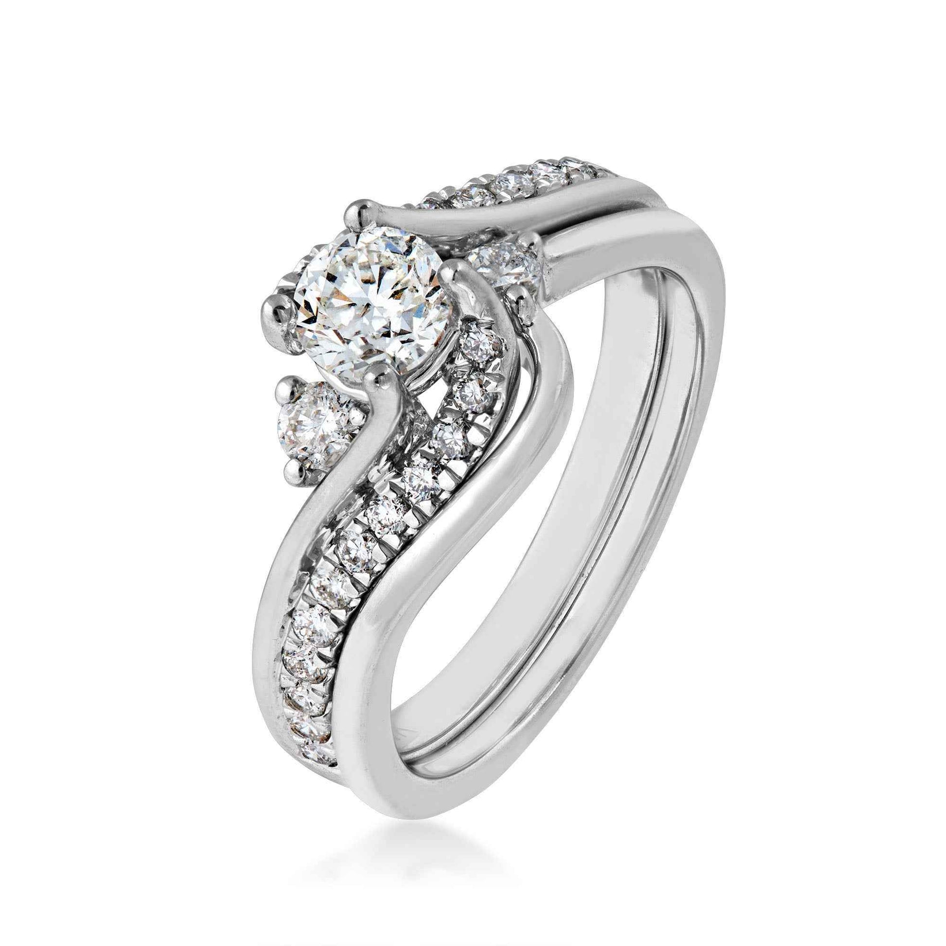 Canadian Rocks 7/8 ct. tw. Round Brilliant Diamond Wedding Set with Twist Accented Band in 14K White Gold close-up detail