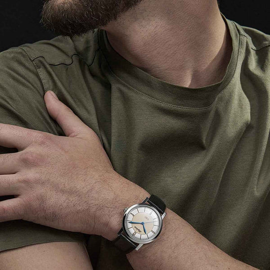 Alpina Heritage Automatic Stainless Steel Watch with Silver & Beige Dial & Black Leather Strap side profile