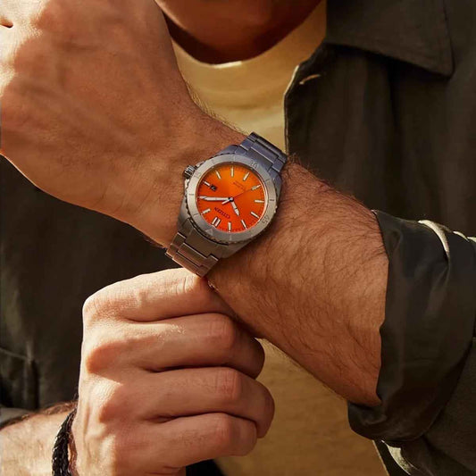 Citizen Men's Brycen Eco-Drive Titanium Watch with Orange Dial close-up detail