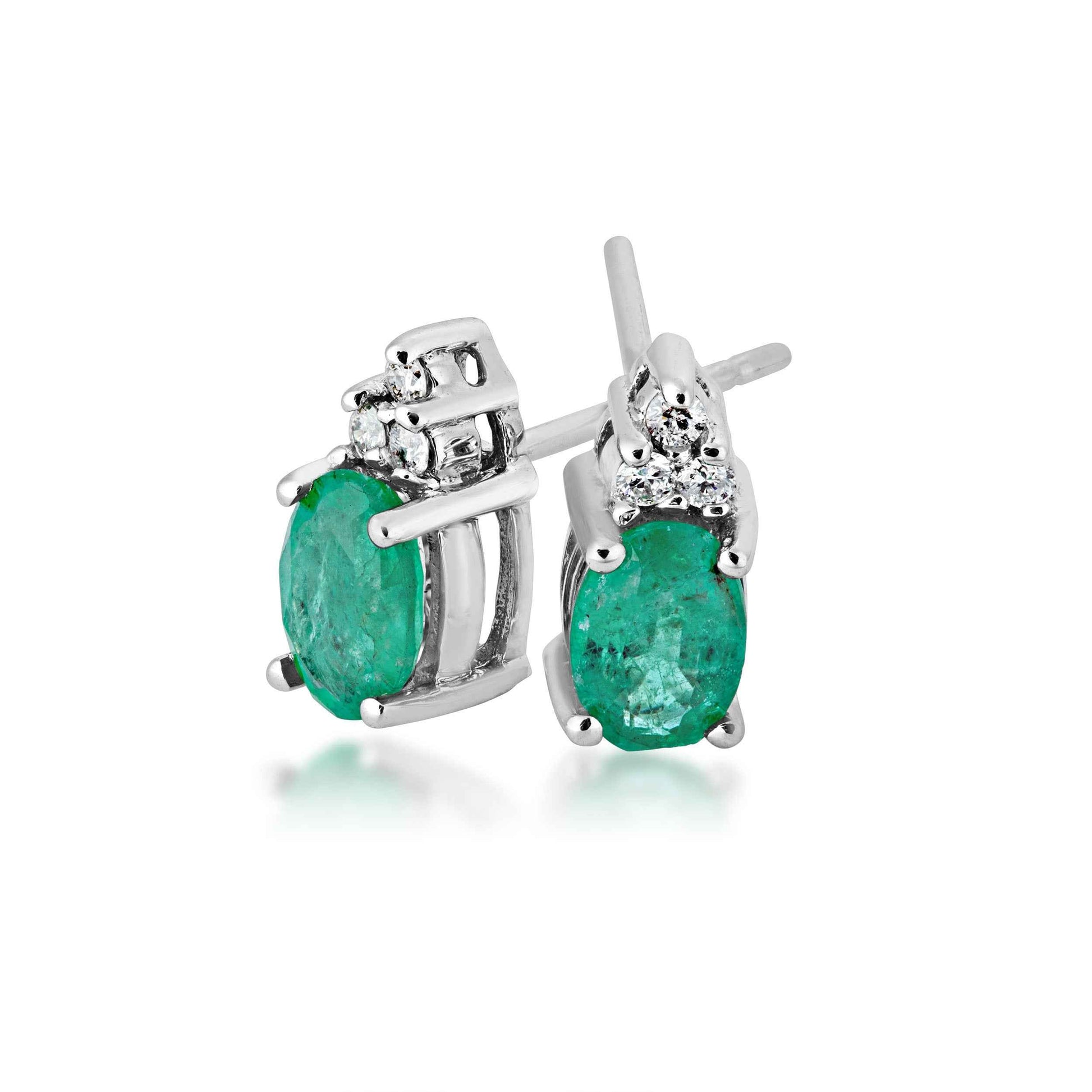 Genuine Oval Shaped Emerald and .06 ct. tw. Diamond Earrings in 10K White Gold