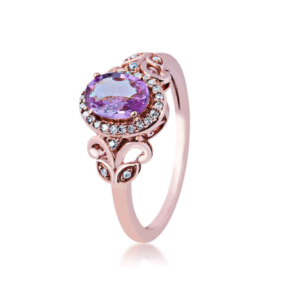 Genuine Oval Pink Sapphire & 1/10 ct. tw. Diamond Halo Fashion Ring with Filigree Inspired Band in 10K Pink Gold front view